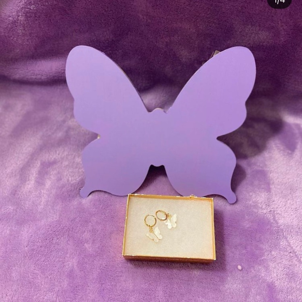 White pearly butterfly huggie earrings